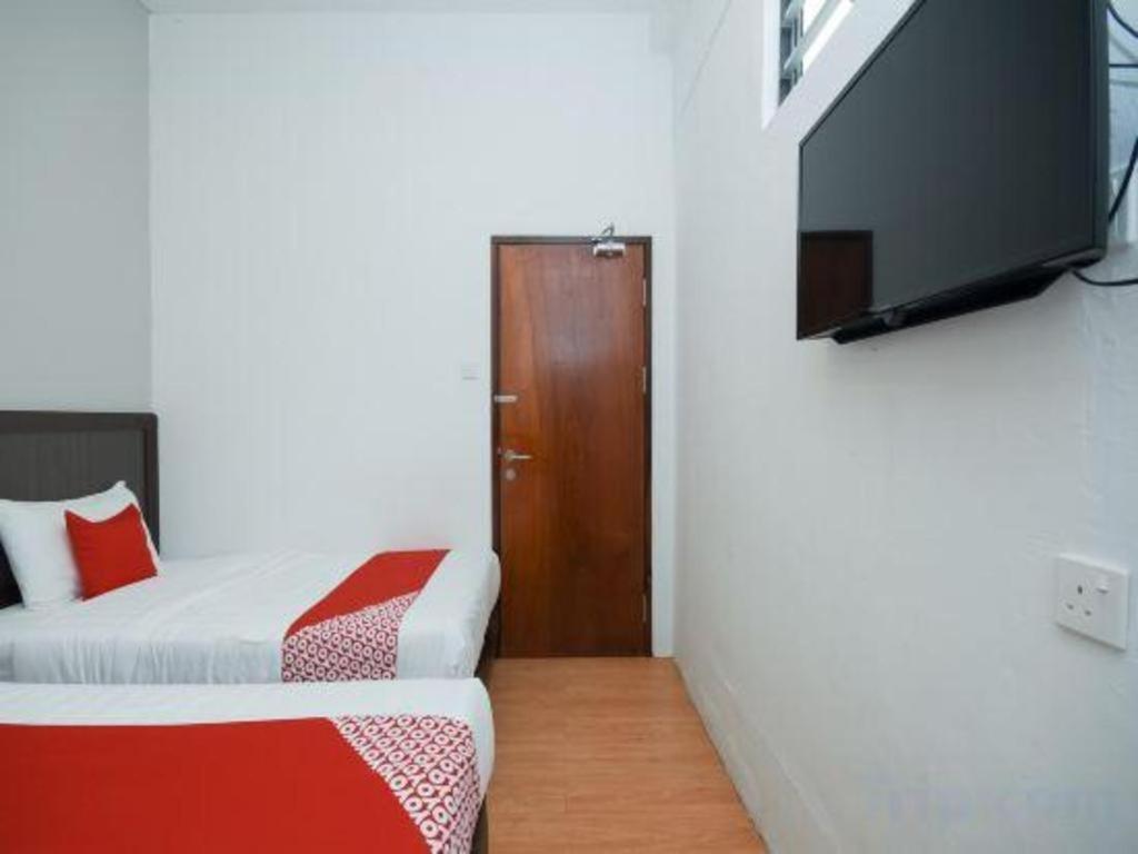 Oyo 1111 Harmony Stay Miri Esterno foto