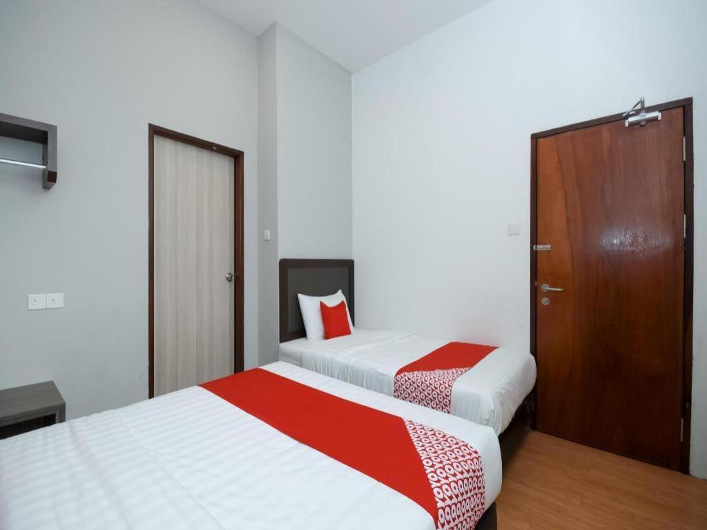 Oyo 1111 Harmony Stay Miri Esterno foto
