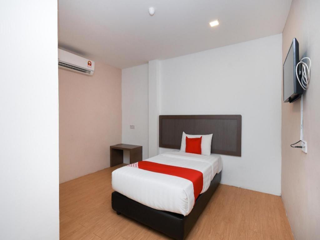 Oyo 1111 Harmony Stay Miri Esterno foto
