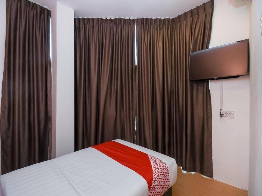 Oyo 1111 Harmony Stay Miri Esterno foto