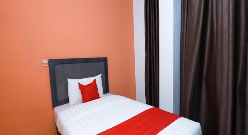 Oyo 1111 Harmony Stay Miri Esterno foto
