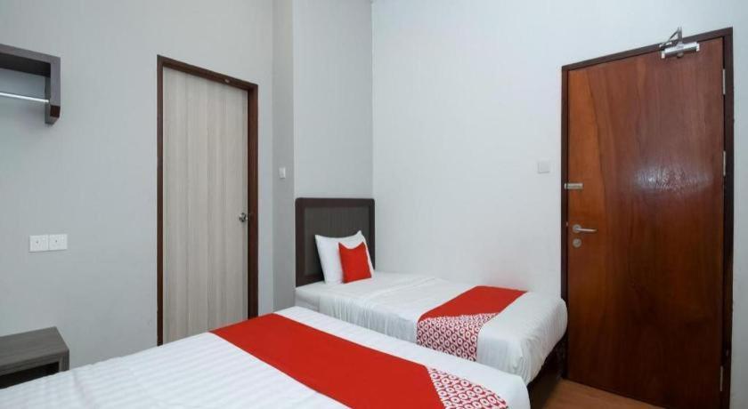 Oyo 1111 Harmony Stay Miri Esterno foto