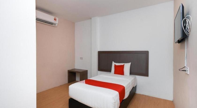 Oyo 1111 Harmony Stay Miri Esterno foto